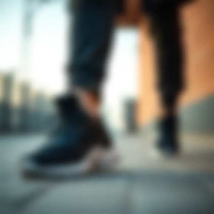 A stylish outfit paired with Hummel Porter black sports shoes demonstrating versatility.