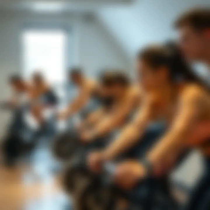 Group of fitness enthusiasts engaged in an indoor cycling class