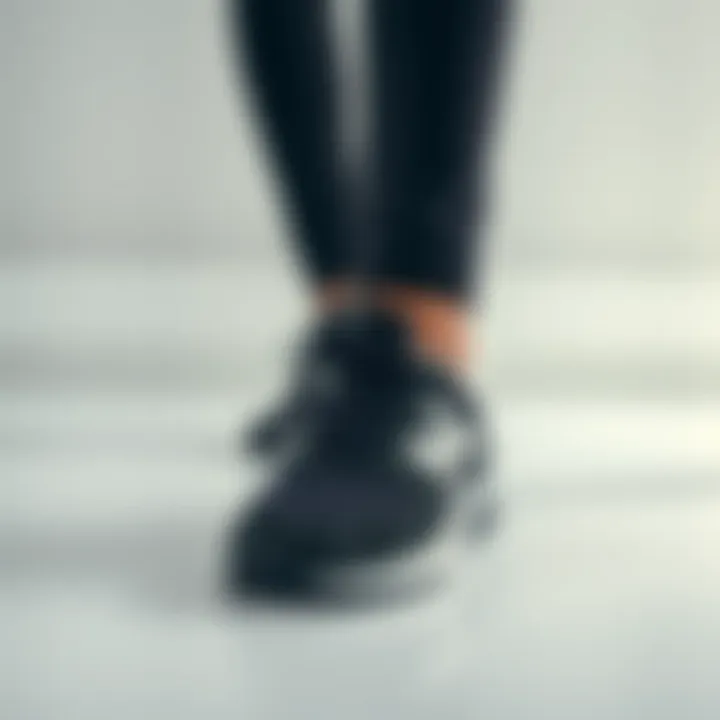 Stylish black New Balance shoes showcased in a minimalist environment.