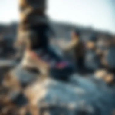 Salomon outdoor boots displayed on rugged terrain, illustrating their functionality