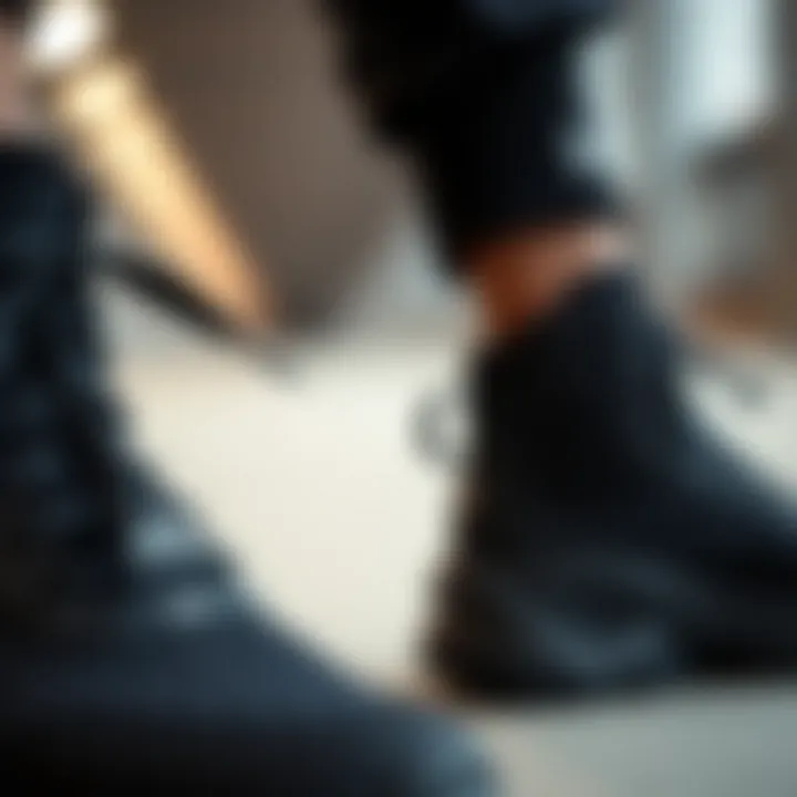 Close-up of Under Armour black shoes showcasing intricate design details